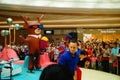 Young female performers perform at the opening ceremony and entertainment of a large shopping mall