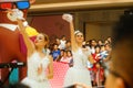 Young female performers perform at the opening ceremony and entertainment of a large shopping mall