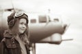 Young female pilot looking into distance