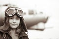 Young female pilot smiling at the camera