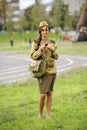 Young female reenactor dressed in uniform of Red Army soldiers of World War II.