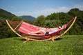 Young female relaxing in a hammock Royalty Free Stock Photo