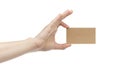 Young female right hand hold blank brown paper card