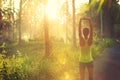 Runner warming up before running at morning forest trail Royalty Free Stock Photo