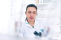 Young Female Scientist Analyzing Sample In Laboratory.laboratory assistant analyzing a sample. Royalty Free Stock Photo