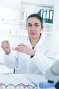 Young Female Scientist Analyzing Sample In Laboratory.laboratory assistant analyzing a sample Royalty Free Stock Photo