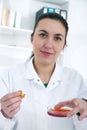 Young Female Scientist Analyzing Sample In Laboratory.laboratory assistant analyzing a sample Royalty Free Stock Photo