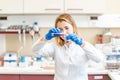 young female scientist conducts chemical experiments in a research laboratory Royalty Free Stock Photo