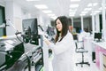 young scientist working with automation blood analyzer report in medical laboratory Royalty Free Stock Photo