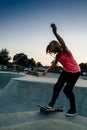 Young female skateboarder at the skatepark