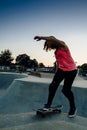 Young female skateboarder at the skatepark Royalty Free Stock Photo