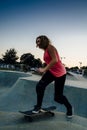 Young female skateboarder at the skatepark