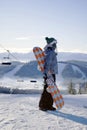 Young female snowboarder