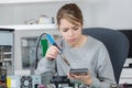 young female soldering pc parts Royalty Free Stock Photo