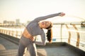 Young female sportsperson having a workout outside