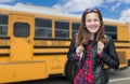 Young Female Student Near School Bus Royalty Free Stock Photo
