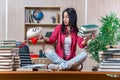 The young female student preparing for college school exams Royalty Free Stock Photo