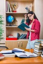 The young female student preparing for college school exams Royalty Free Stock Photo