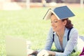 Young female student using laptop outdoor Royalty Free Stock Photo
