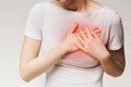 Young female suffering from severe chest pain Royalty Free Stock Photo