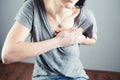 Young female suffering from severe chest pain Royalty Free Stock Photo