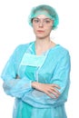 Young female surgeon doctor standing with arms crossed and smiling, Isolated over white background Royalty Free Stock Photo