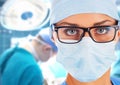 Young female surgeon in operation room Royalty Free Stock Photo