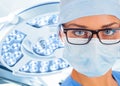 Young female surgeon in operation room. Royalty Free Stock Photo