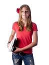 Young female teenage student carrying books Royalty Free Stock Photo