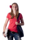 Young female teenage student carrying books Royalty Free Stock Photo