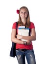 Young female teenage student carrying books Royalty Free Stock Photo