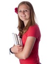 Young female teenage student carrying books Royalty Free Stock Photo