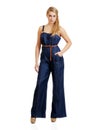 Young female teenager in jeans jumpsuit