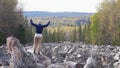 Young Female Tourist Hiking in Taganay National Park in Russia in Autumn.`Big Stone River`, Biggest Deposit Occurrence