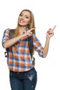 Young female tourist pointing to the side Royalty Free Stock Photo