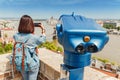 Female tourist taking photos of the old town of Budapest. Travel and view point concept