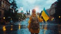 Young Female Tourist With Ukrainian Flag on Rainy City Street Royalty Free Stock Photo