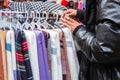 Young female tourist woman shopping and choosing clothes on street market in Istanbul Turkey Royalty Free Stock Photo