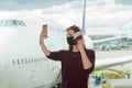 young female traveler, Blogger in airport lounge near windows happy smile taking selfie photo flight Royalty Free Stock Photo