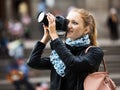 Young female traveller with camera Royalty Free Stock Photo