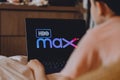 HBO Max logo on the laptop screen