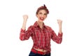 Young female winner raising arms, clenching fists, exclaiming with joy and excitement Royalty Free Stock Photo