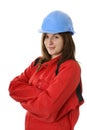 Young female worker with blue helmet