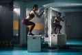 A young female doing a box jump in the gym Royalty Free Stock Photo