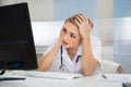 Worried Doctor Looking At Computer
