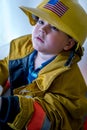 Young firefighter with hard hat Royalty Free Stock Photo