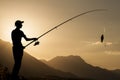 Young fisherman silhouette Royalty Free Stock Photo