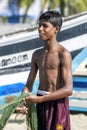 A young fisherman in Sri Lanka.