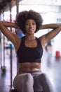 Black woman doing sit ups at the gym Royalty Free Stock Photo