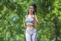 Young fit beautiful girl running outdoor Royalty Free Stock Photo